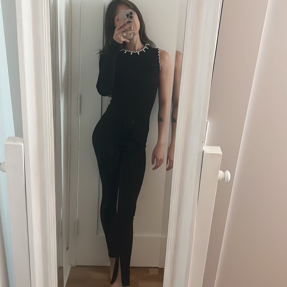 Area black asymmetrical jumpsuit with crystal embellishment